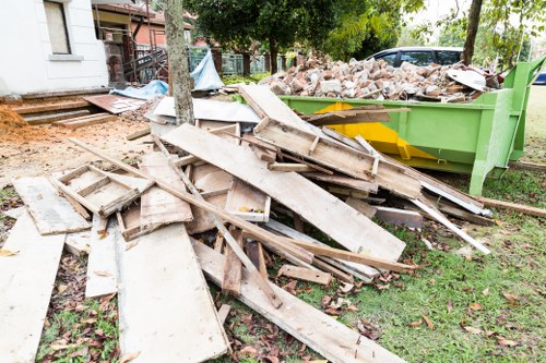 Vans lined up outside Earls Court property ready for house clearance